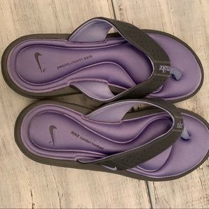 Nike comfort footbed flipflops size 9. Purple/gray